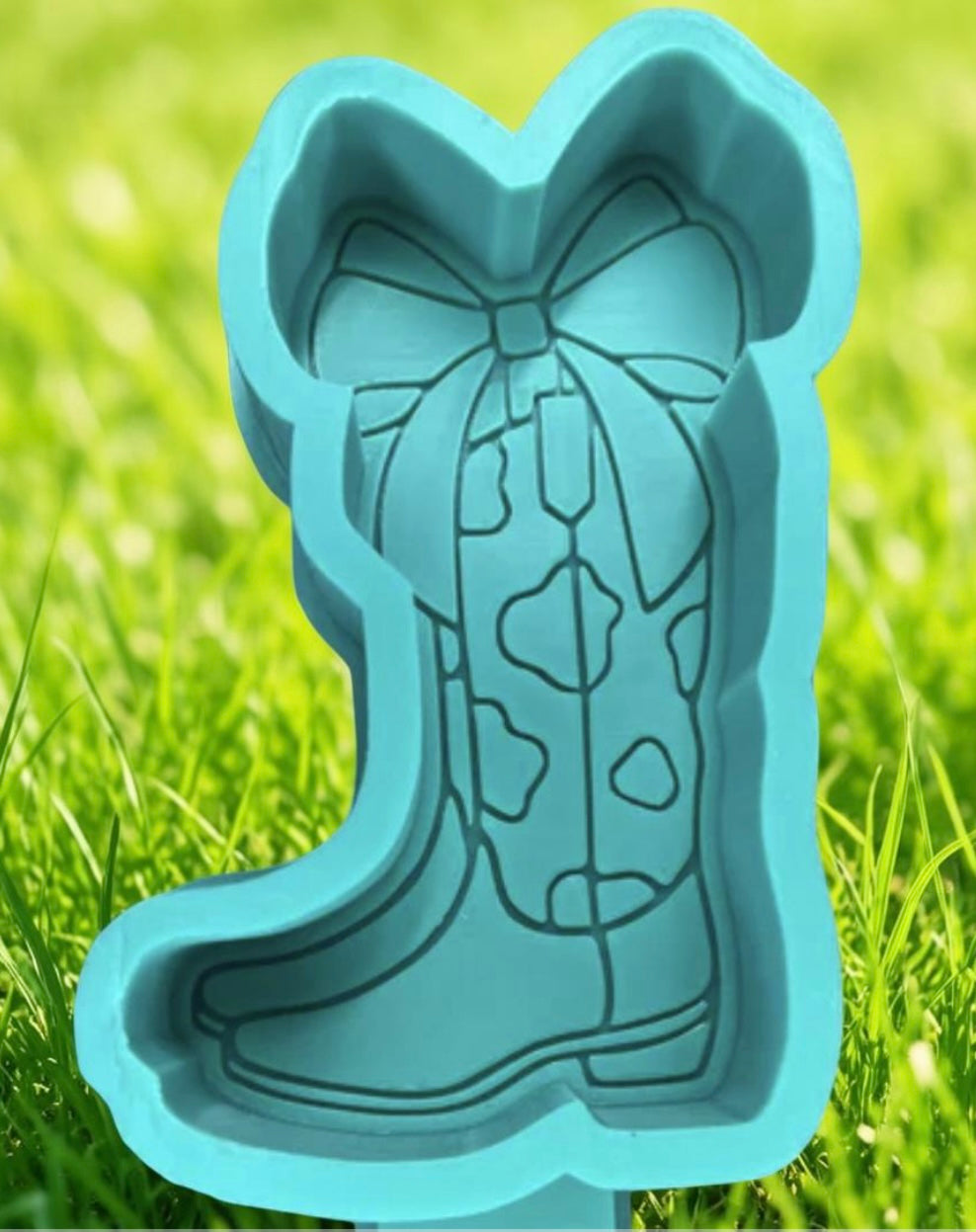 Cow print boot with bow car freshie mold.