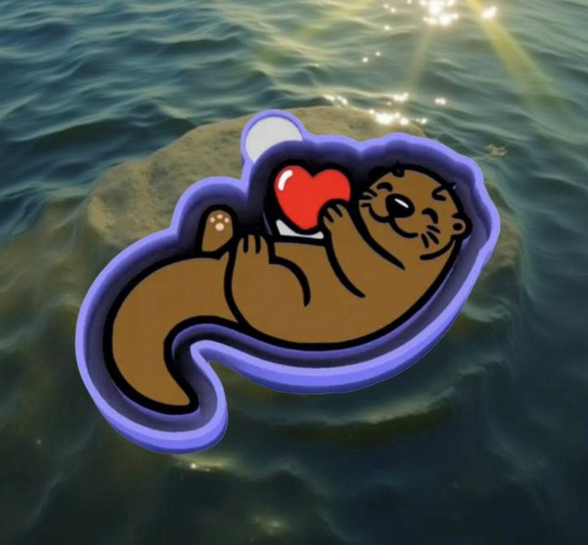 Loving otter car freshie mold.