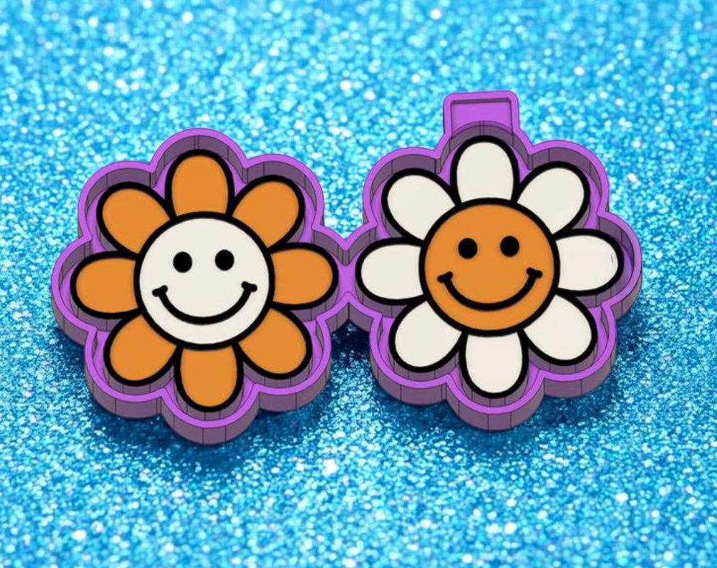 Smiley face flower vent clips.
