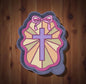 Cross with bow in stain glass car freshie mold.