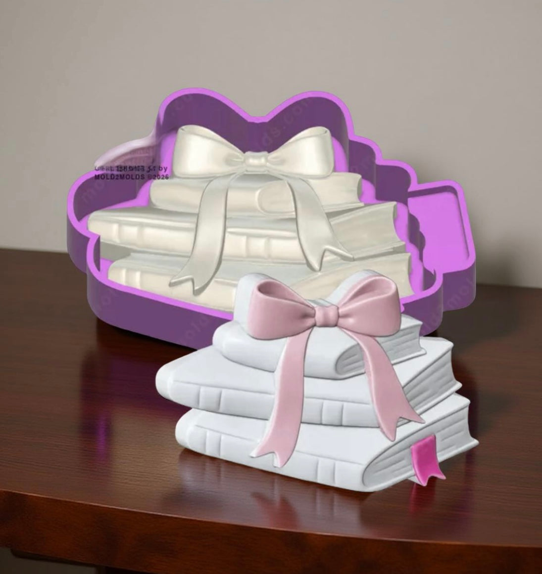 3D stack of books with bow car freshie mold.