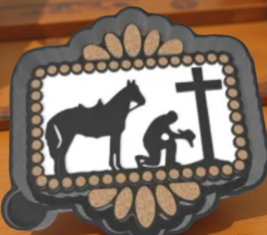 Cowboy praying at freshie mold.