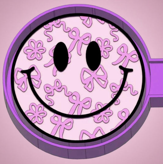 Smiley face with bows car freshie mold.