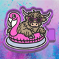 Highland cow on a  flamingo raft car freshie mold.