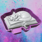 3D sleeping cat on book freshie molds.