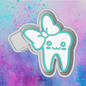 Tooth with bow car freshie mold.